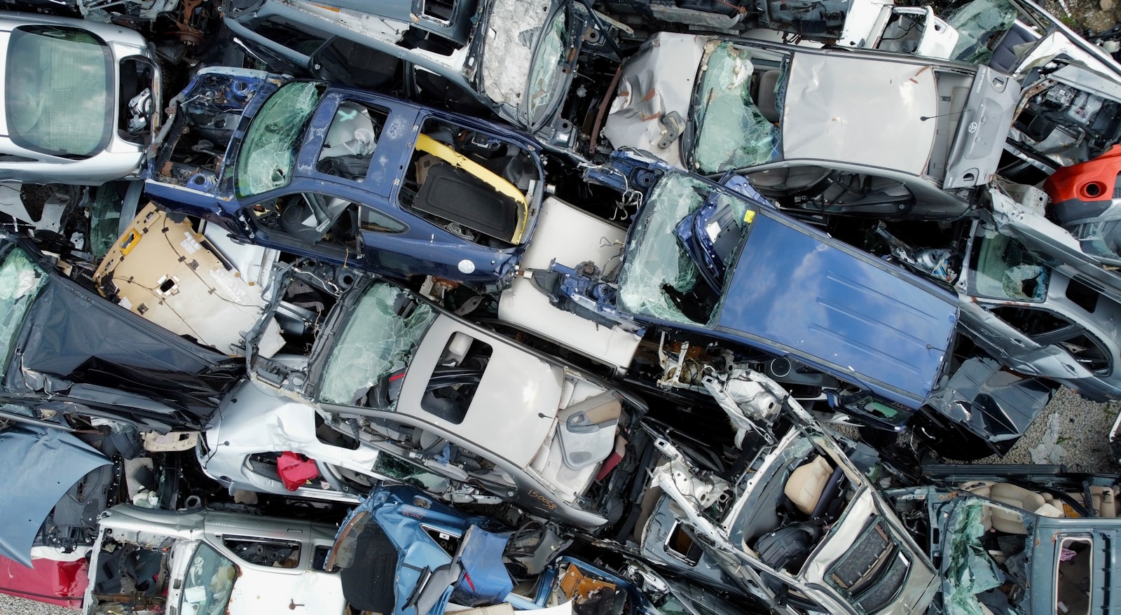 Scrap car yard at sunset